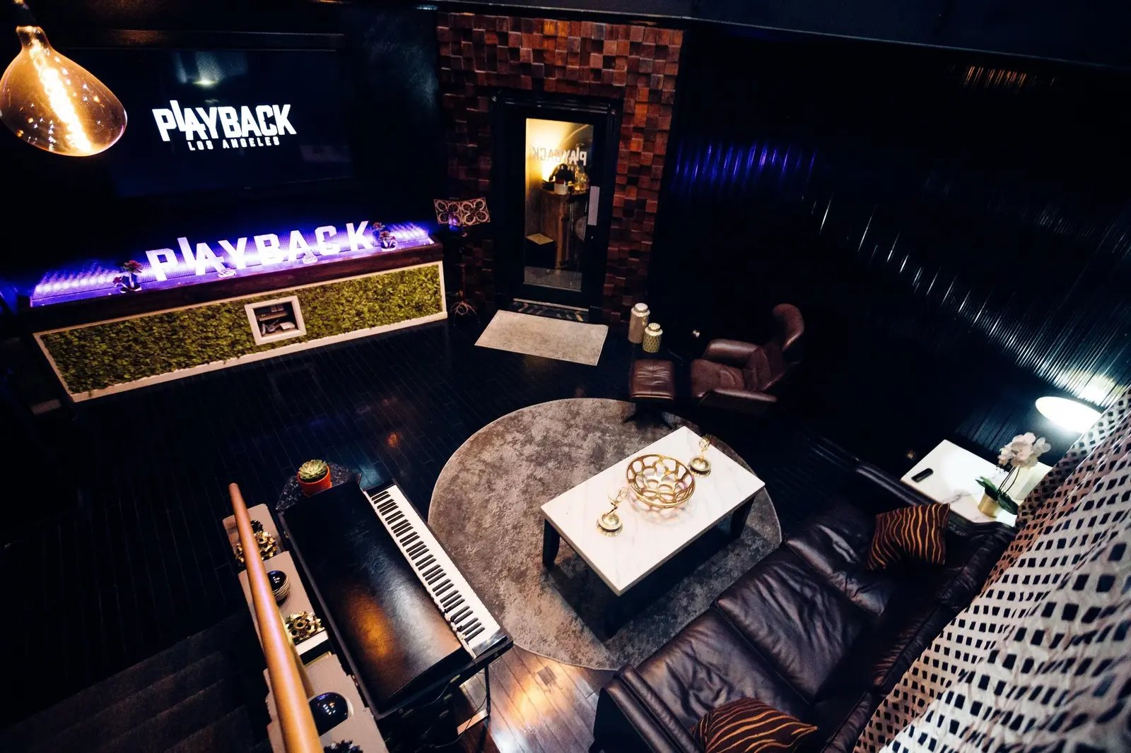 Playback lounge with piano and comfortable seating